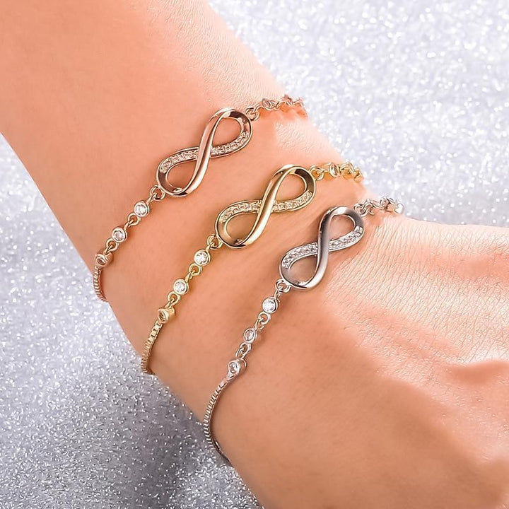 Elegant women's adjustable infinity bracelet in a choice of silver, gold, or rose gold, perfect symbolic jewelry.