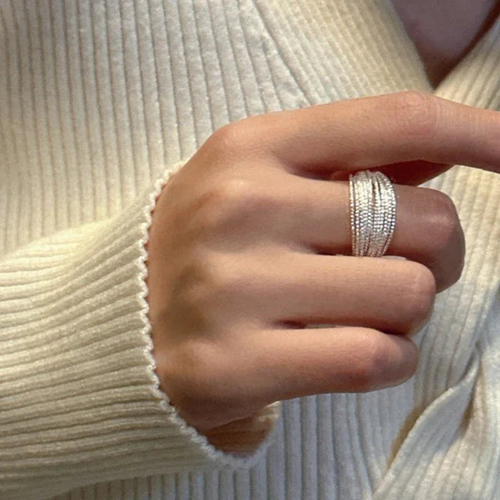 Detailed filigree adjustable ring, a stunning layered silver jewelry piece for women seeking elegant and versatile fashion.