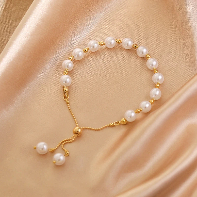 Versatile adjustable pearl bracelet for women, featuring lustrous pearls for an elegant, timeless look.