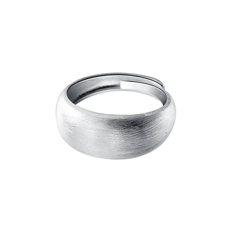 Elegant women's adjustable pure silver dome ring with a brushed finish. Timeless and versatile fashion jewelry.