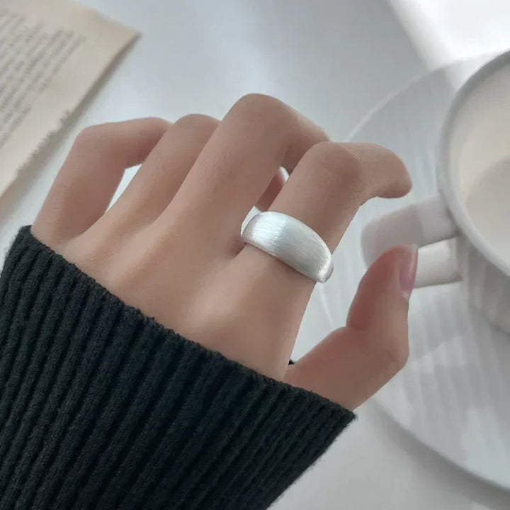 Adjustable silver dome ring for women, featuring a sophisticated brushed finish. Pure silver, elegant and chic.