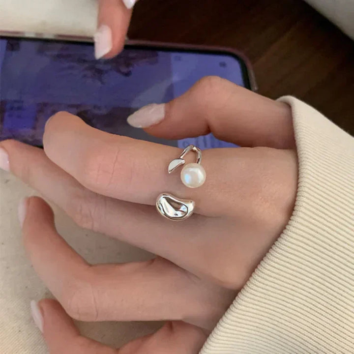 Chic & elegant adjustable pearl ring, perfect women's jewelry for any occasion. Features natural pearl & silver.