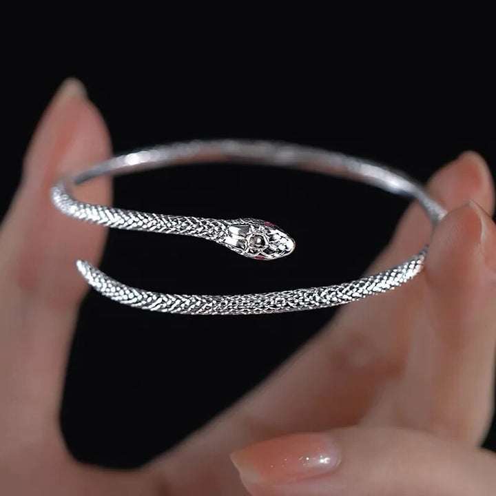 Elegant women's adjustable sterling silver snake bracelet, a chic fashion accessory for her.