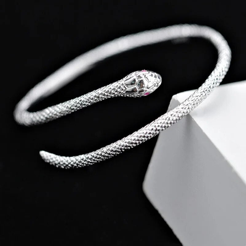 Close-up of adjustable silver snake bracelet showing intricate sterling silver design and secure clasp.