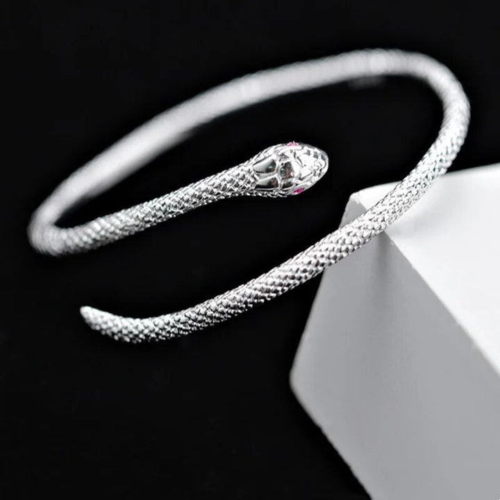 Close-up of adjustable silver snake bracelet showing intricate sterling silver design and secure clasp.