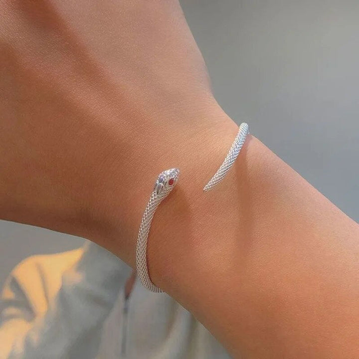 Sophisticated women's snake jewelry: an adjustable sterling silver bracelet that adds a touch of elegance.