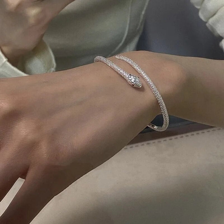 Unique adjustable silver snake bracelet, a striking women's accessory crafted from premium sterling silver.