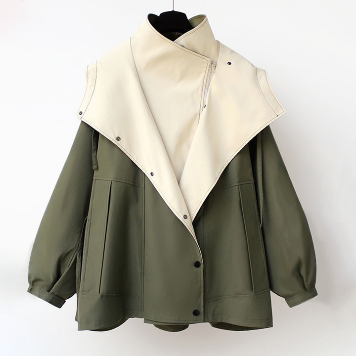 Lightweight, water-resistant women's jacket with an adjustable waist for stylish protection.