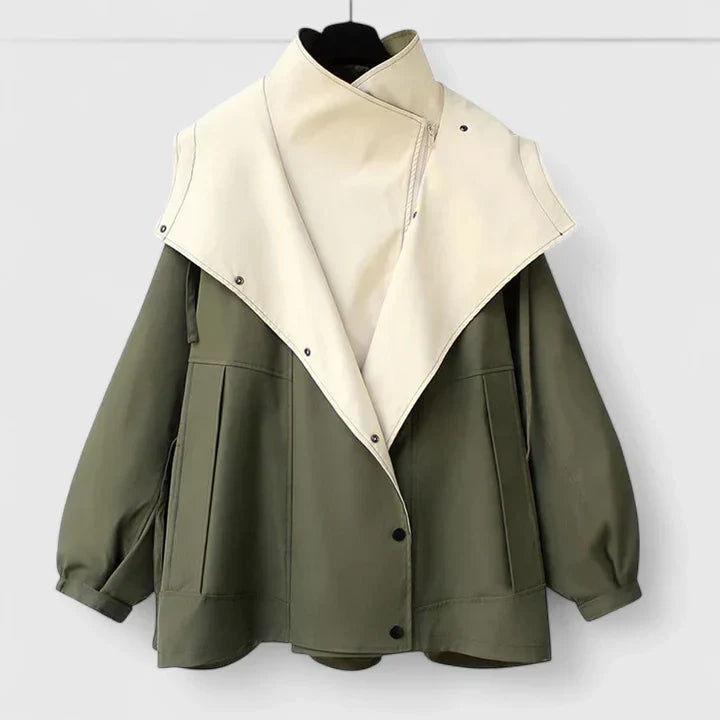 Back view of the women's transitional outerwear, showing the elegant silhouette and adjustable waist detail.