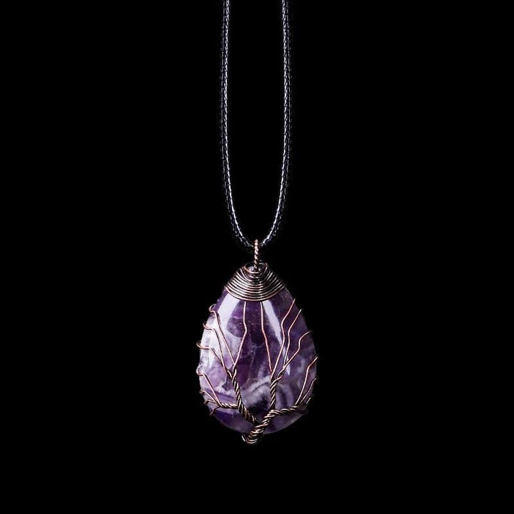 Elegant women's amethyst drop pendant necklace featuring a polished purple crystal, perfect for spiritual or boho style.