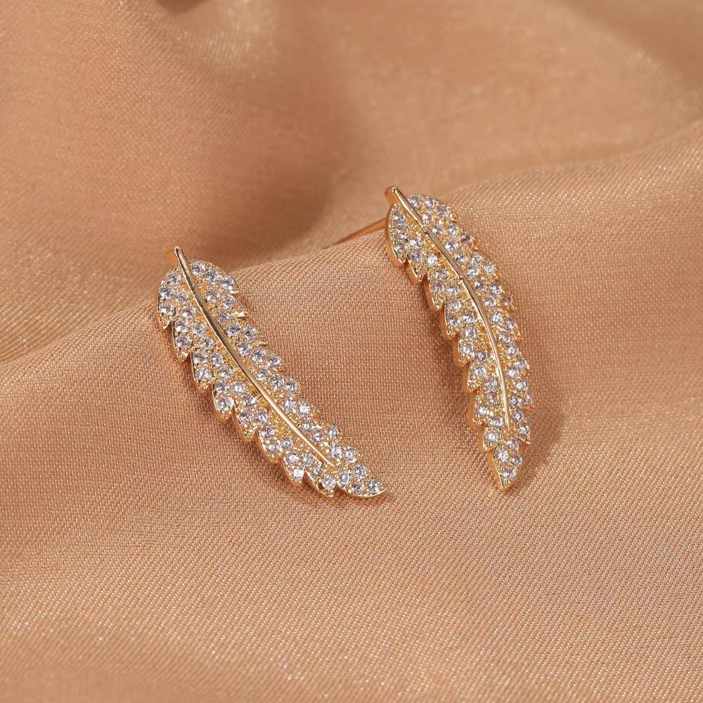 Elegant women's angel wing dangle earrings, sterling silver & gold plated.