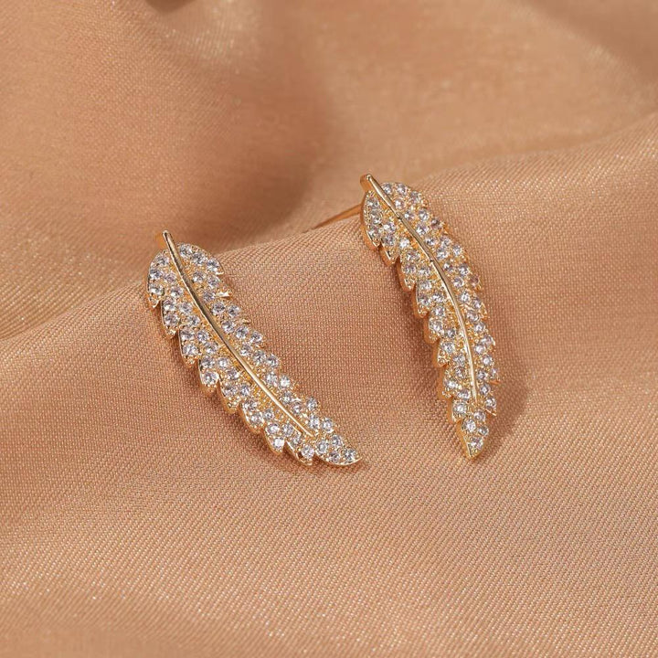 Elegant women's angel wing dangle earrings, sterling silver & gold plated.