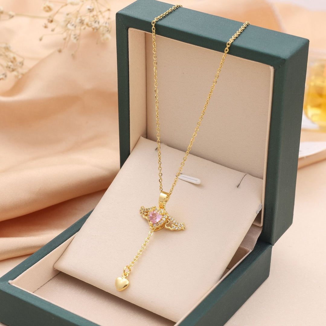 Gold angel wings necklace with a beautiful gemstone, a celestial pendant and a perfect elegant gift for her.