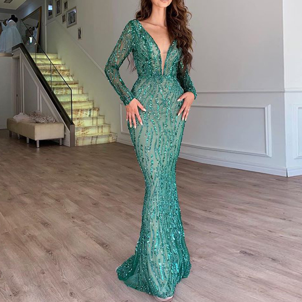 Elegant women's ankle-length sequin dress with long sleeves, perfect for evening, gala, or wedding guest attire.