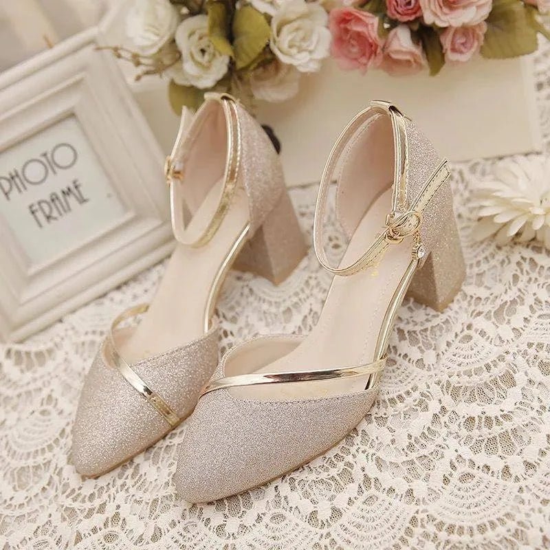 Versatile women's pumps with a chic ankle strap and comfortable block heel, great for office or evenings out.
