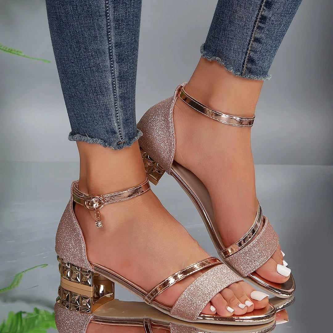 Dressy women's block heel sandals with ankle strap, perfect for evening wear or elegant gatherings.