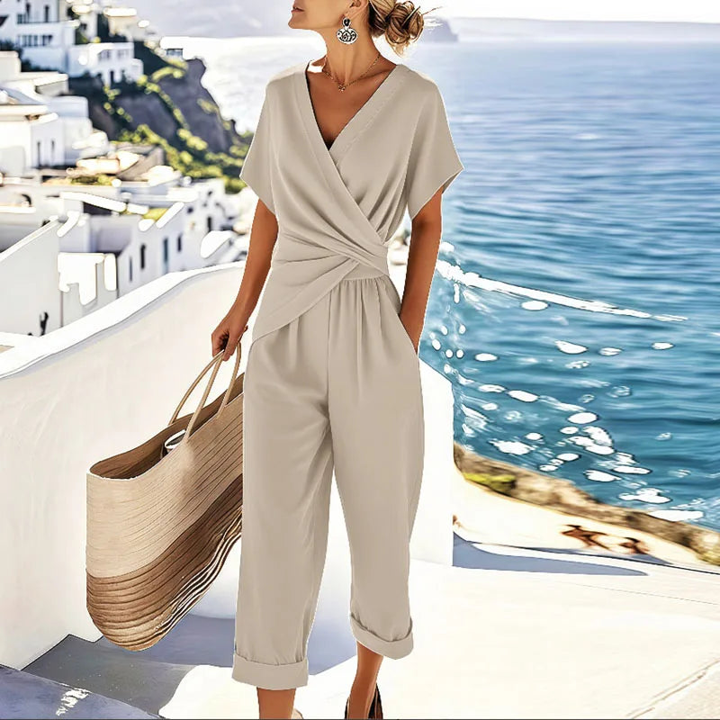 Elegant women's apricot wrap wide-leg jumpsuit with a flattering waist, perfect for summer casual chic.