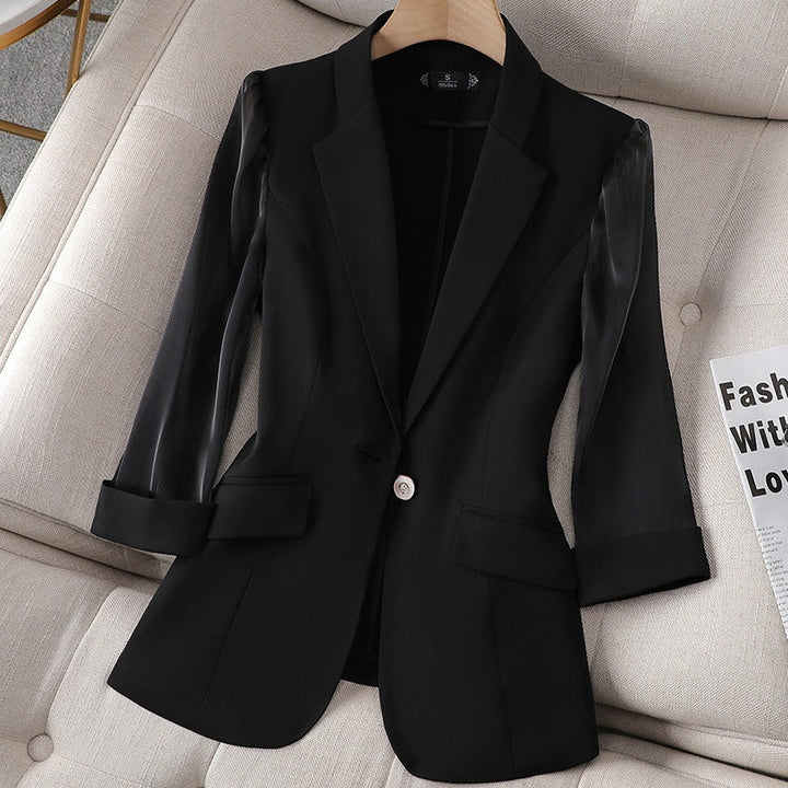 Elegant women's Aria tailored blazer with chic sheer sleeves, perfect for professional or office fashion.