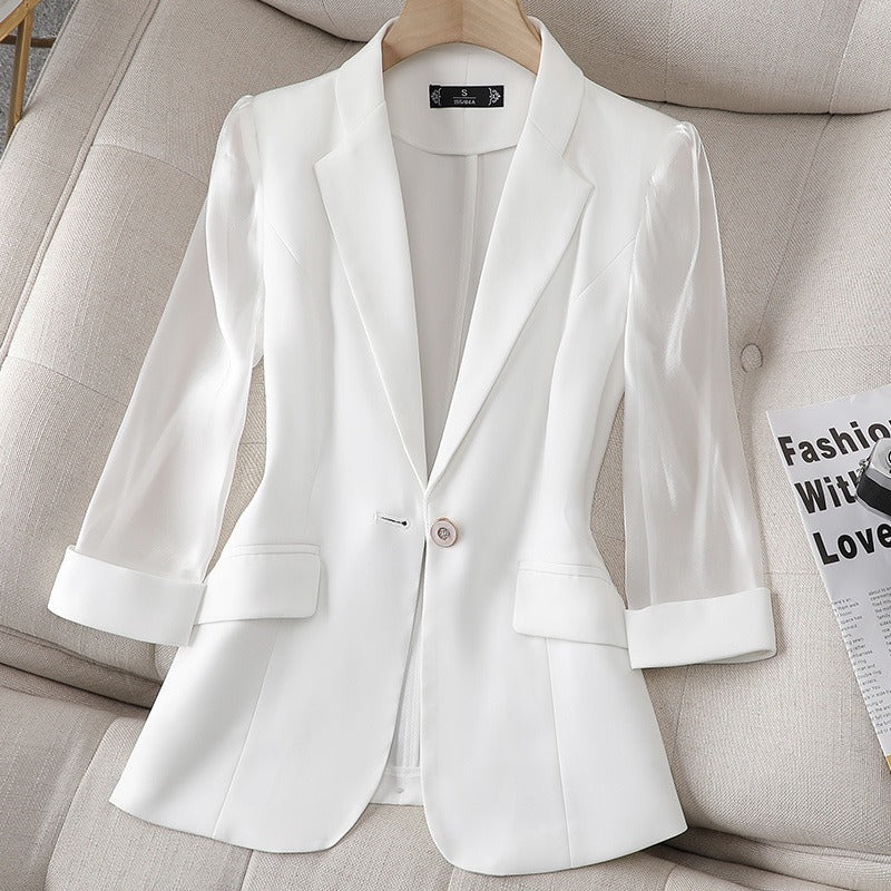 Professional black women's Aria tailored jacket with elegant sheer sleeves, ideal for office and chic wear.