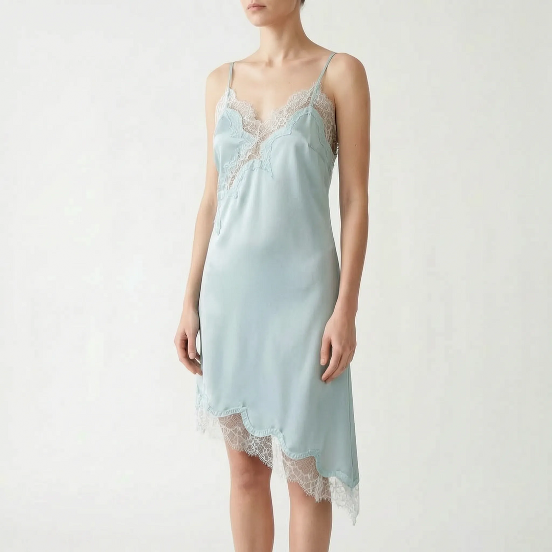 Elegant women's V-neck slip dress with subtle lace details and an asymmetric hem. Ideal for evening parties & events.