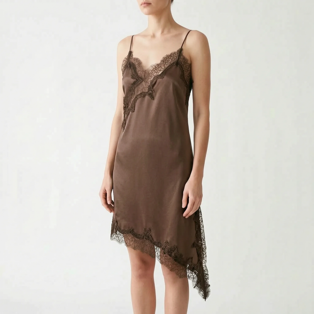 Versatile women's slip dress, perfect for evening. Features a V-neck, lace trim, and a chic asymmetric hem for parties.