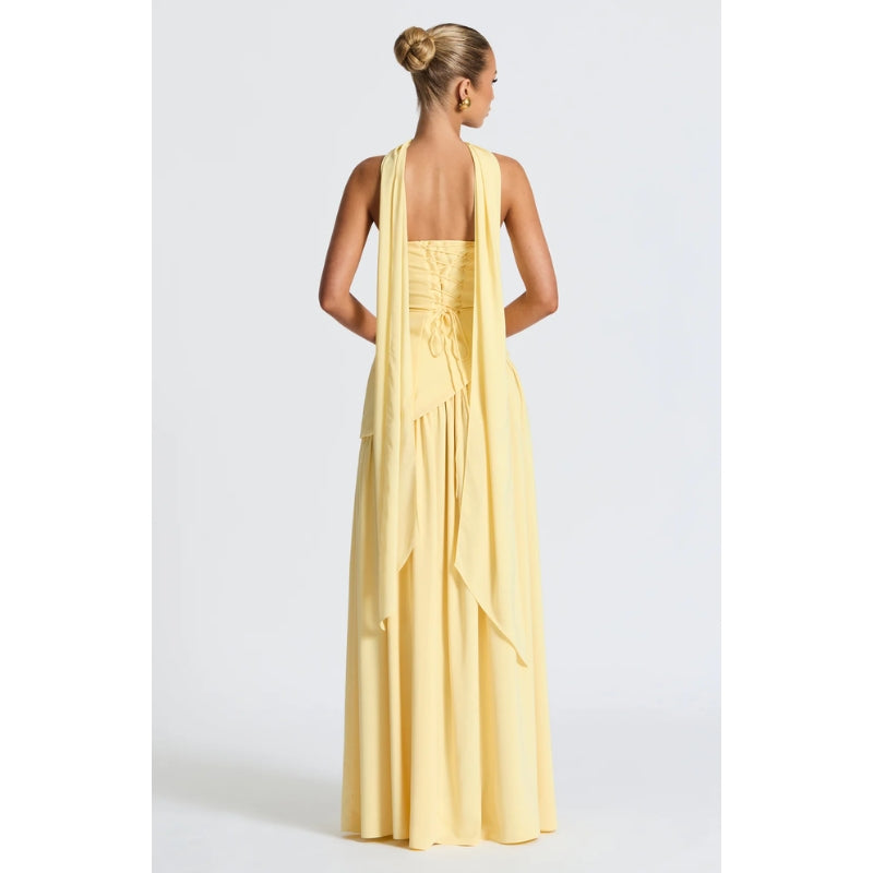 Sophisticated women's asymmetric strapless midi dress with a flowing skirt.