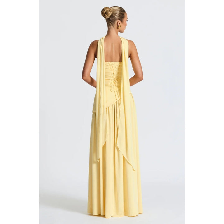 Sophisticated women's asymmetric strapless midi dress with a flowing skirt.