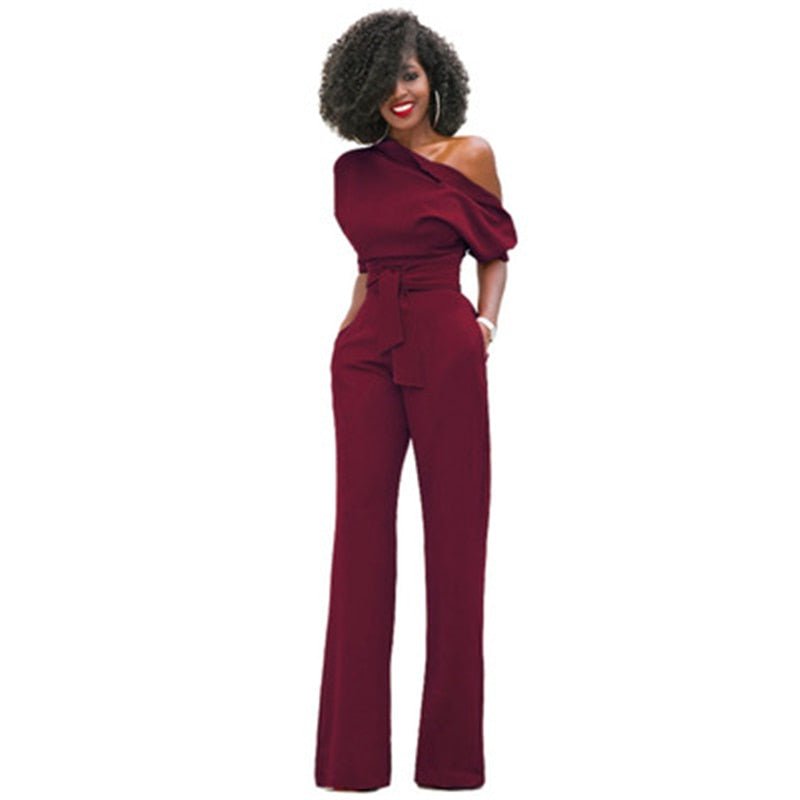 Fashionable women's asymmetrical one-shoulder wide-leg jumpsuit, ideal for elegant party and evening wear.