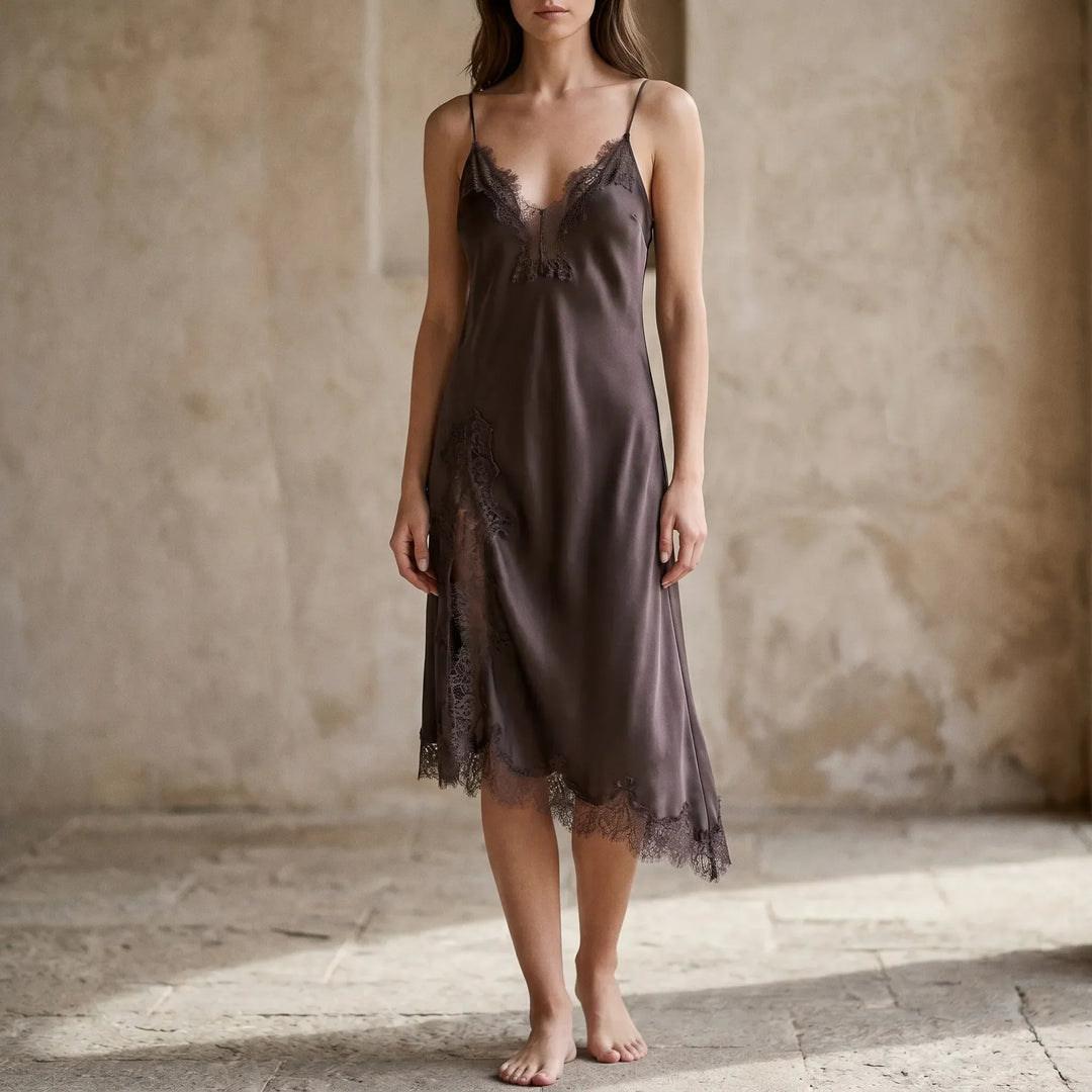 Elegant women's asymmetrical V-neck slip midi dress with lace trim, perfect for summer evenings & parties.
