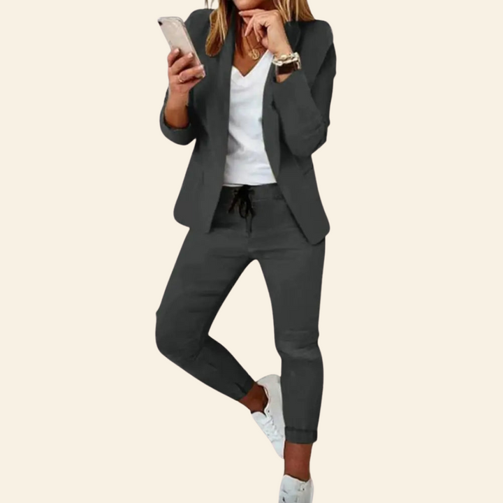 Stylish Aurora women's outfit. Elegant long sleeve & tailored pants set, offering chic apparel and comfort for daily wear.
