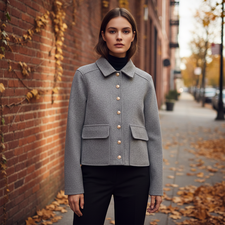 Elegant women's autumn wool blend jacket with classic buttons, showcasing tailored fit and fall fashion.