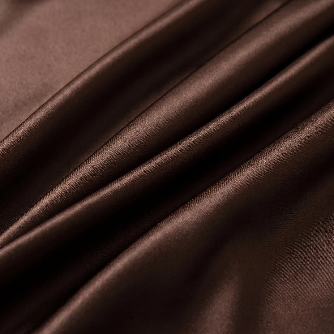 Sleek women's floor-length slip gown with a backless design, an elegant choice for evening wear.