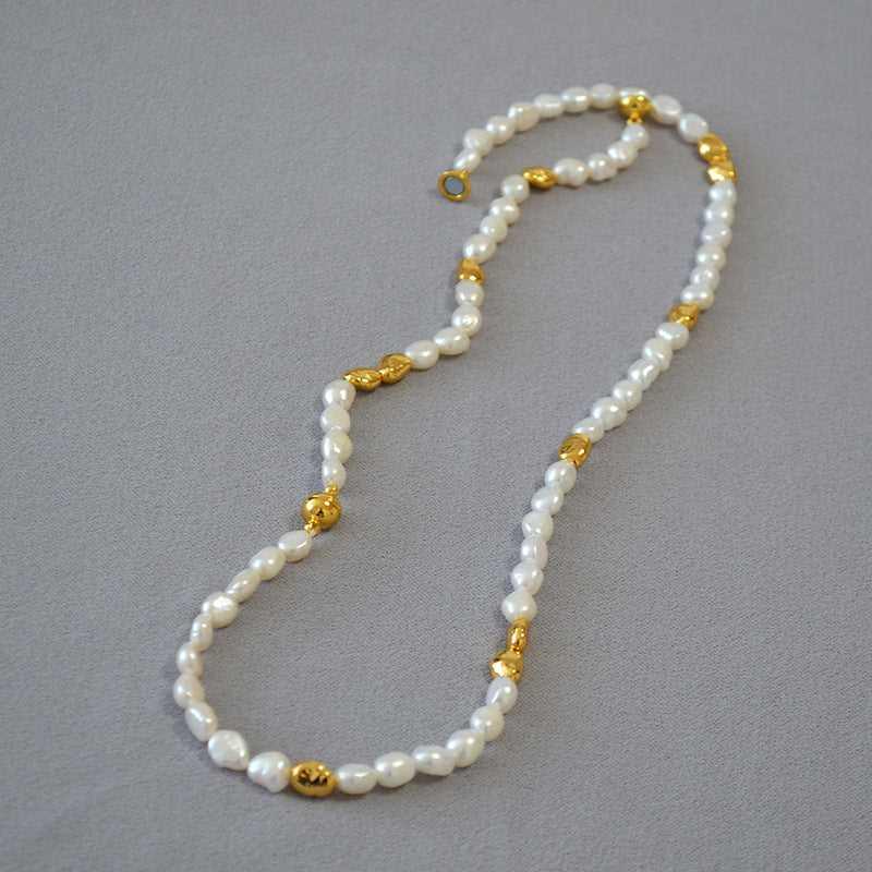 Elegant women's baroque pearl necklace with unique geometric gold accents, a handmade statement piece for her.