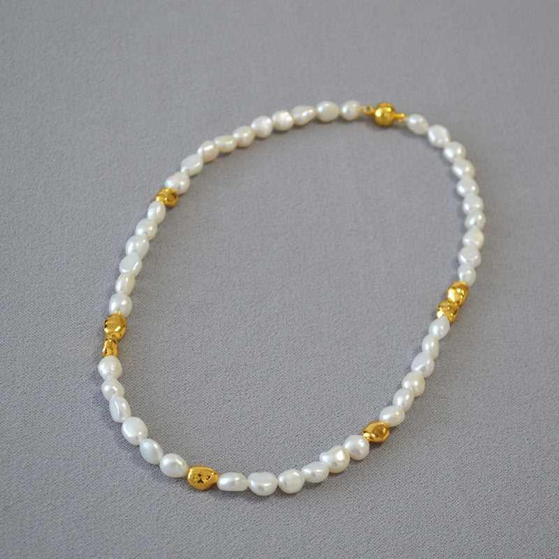 Unique Elodie women's baroque pearl necklace, an elegant handmade gift featuring geometric accents for her.