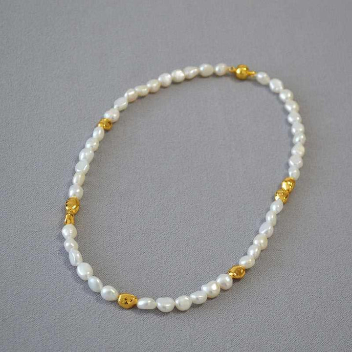 Unique Elodie women's baroque pearl necklace, an elegant handmade gift featuring geometric accents for her.