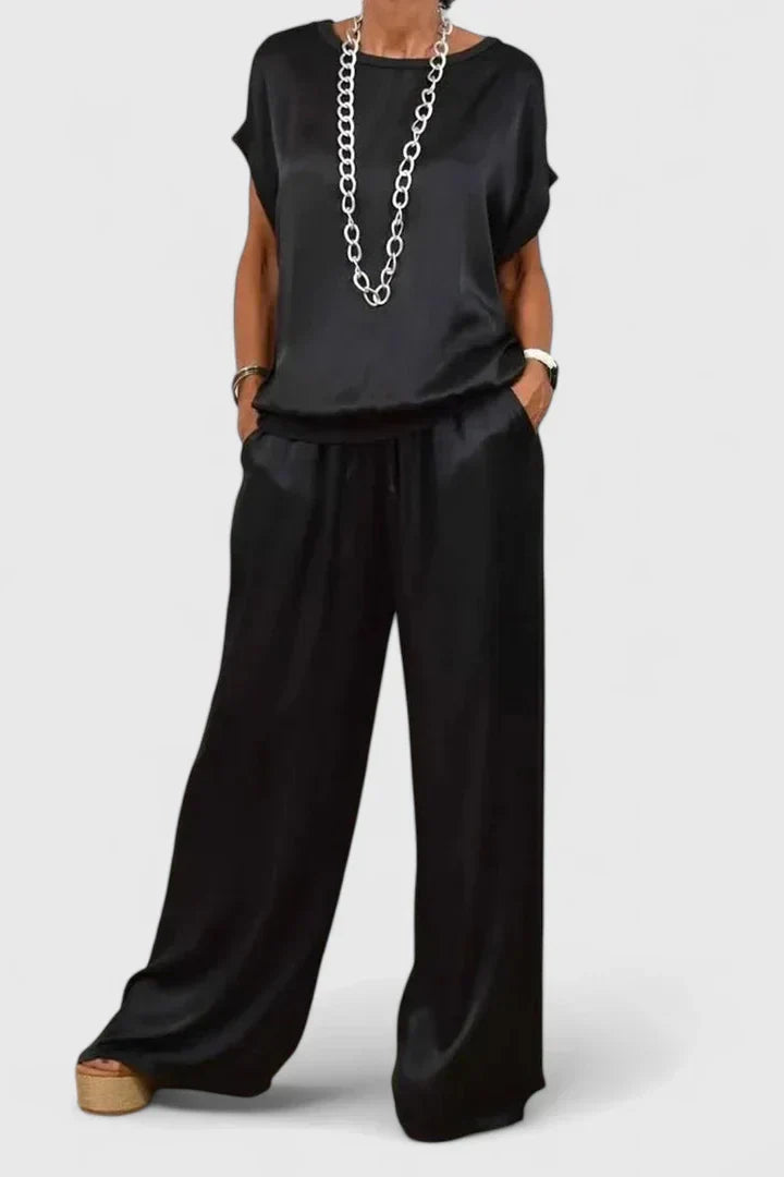 Elegant women's batwing top & wide leg trouser set, perfect for chic casual wear or versatile events.