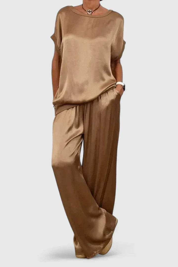Versatile women's batwing top & wide leg pants set. Elegant, comfortable, and perfect for various occasions.