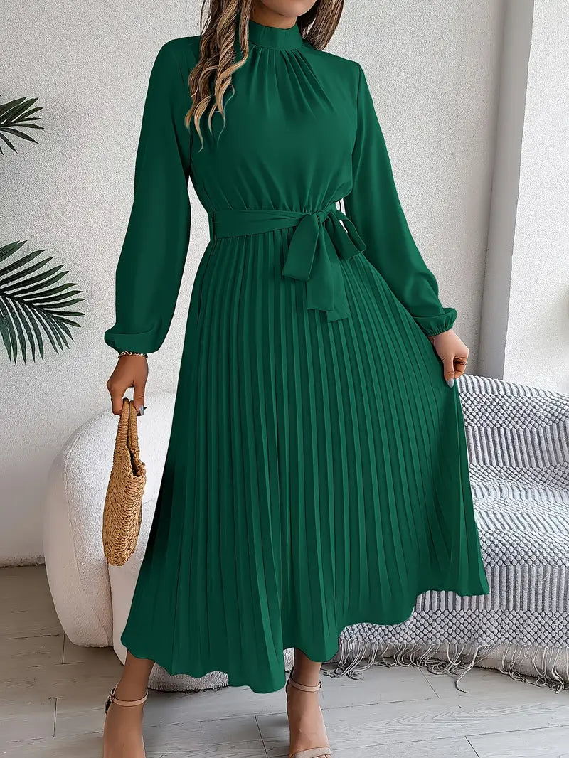Sophisticated pleated midi dress for women, ideal for elegant fall or spring occasions.
