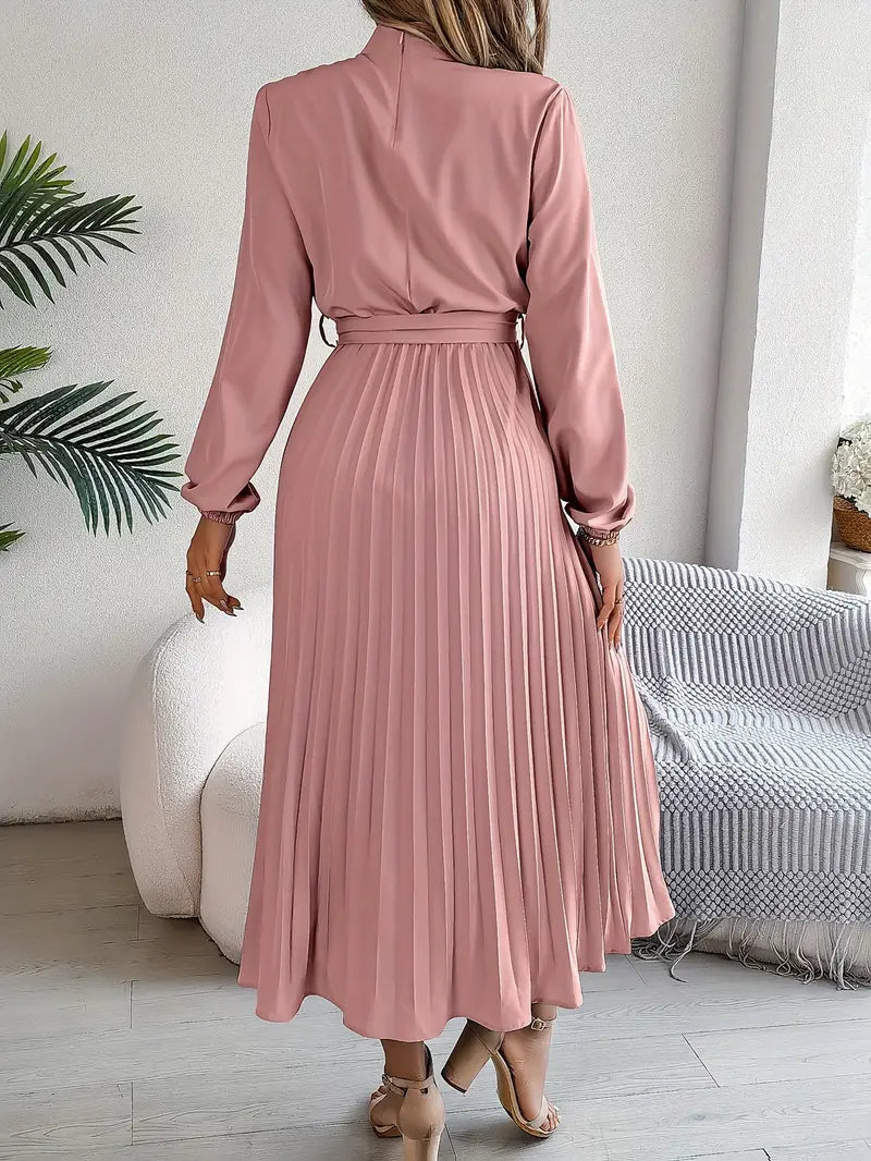 Fashionable women's fall/spring midi dress, elegantly pleated and belted for a chic look.