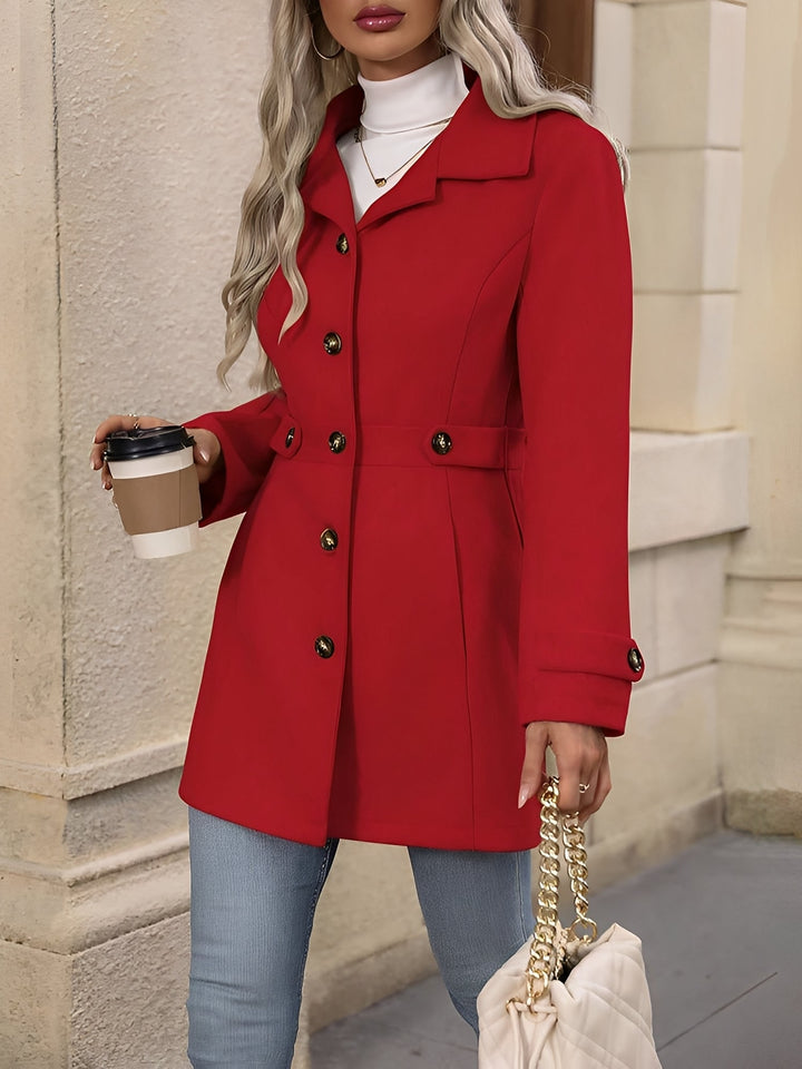 Women's classic trench coat designed with an elegant notch collar & a flattering adjustable belt.