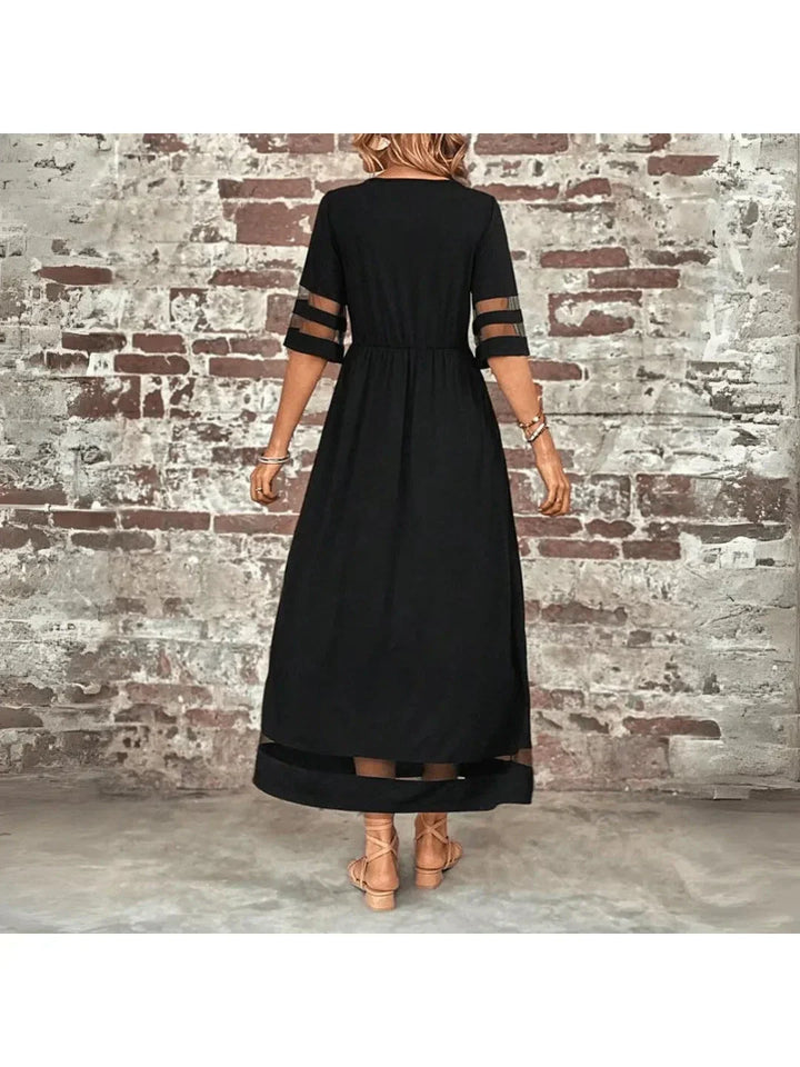 Women's elegant black midi dress featuring tummy coverage for a smooth, flattering silhouette. Comfortable style.
