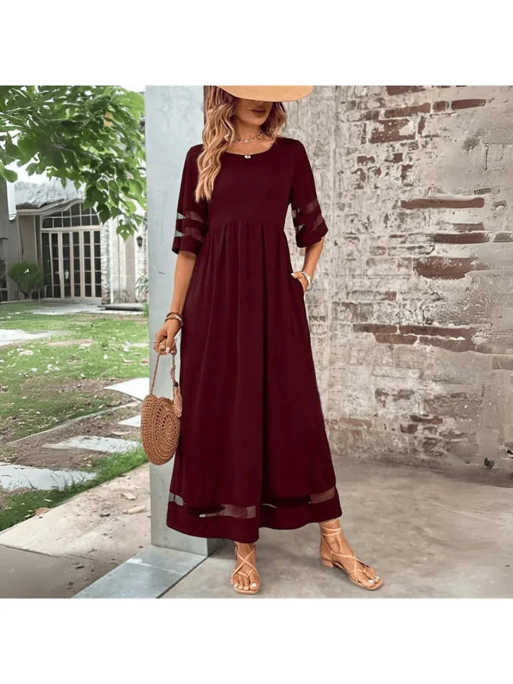 Versatile women's red midi dress. Comfortable, flattering design with tummy control, ideal for elegant or casual looks.