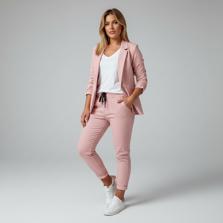 Versatile women's black two-piece, combining a sharp blazer and comfortable trousers for any season