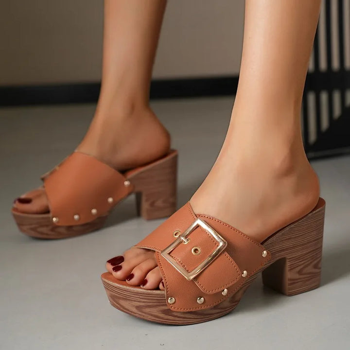 Chic women's dress shoes: slip-on buckle block heel slides with a comfortable design.