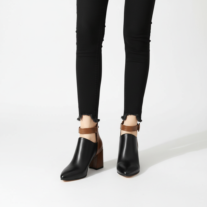 Two-tone women's ankle boots, faux leather, chic design with comfortable block heel, ideal winter shoes.