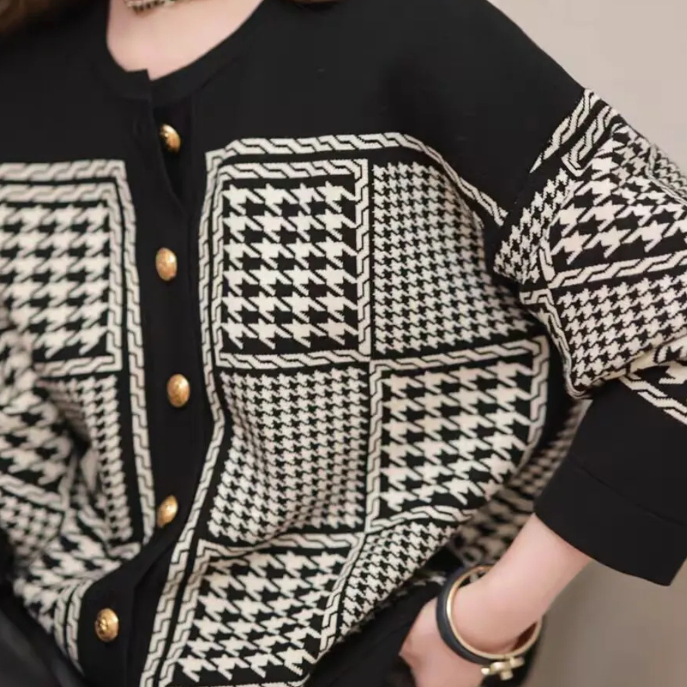 Chic black houndstooth cardigan for women. Versatile, elegant top, perfect for a timeless autumn & winter outfit.