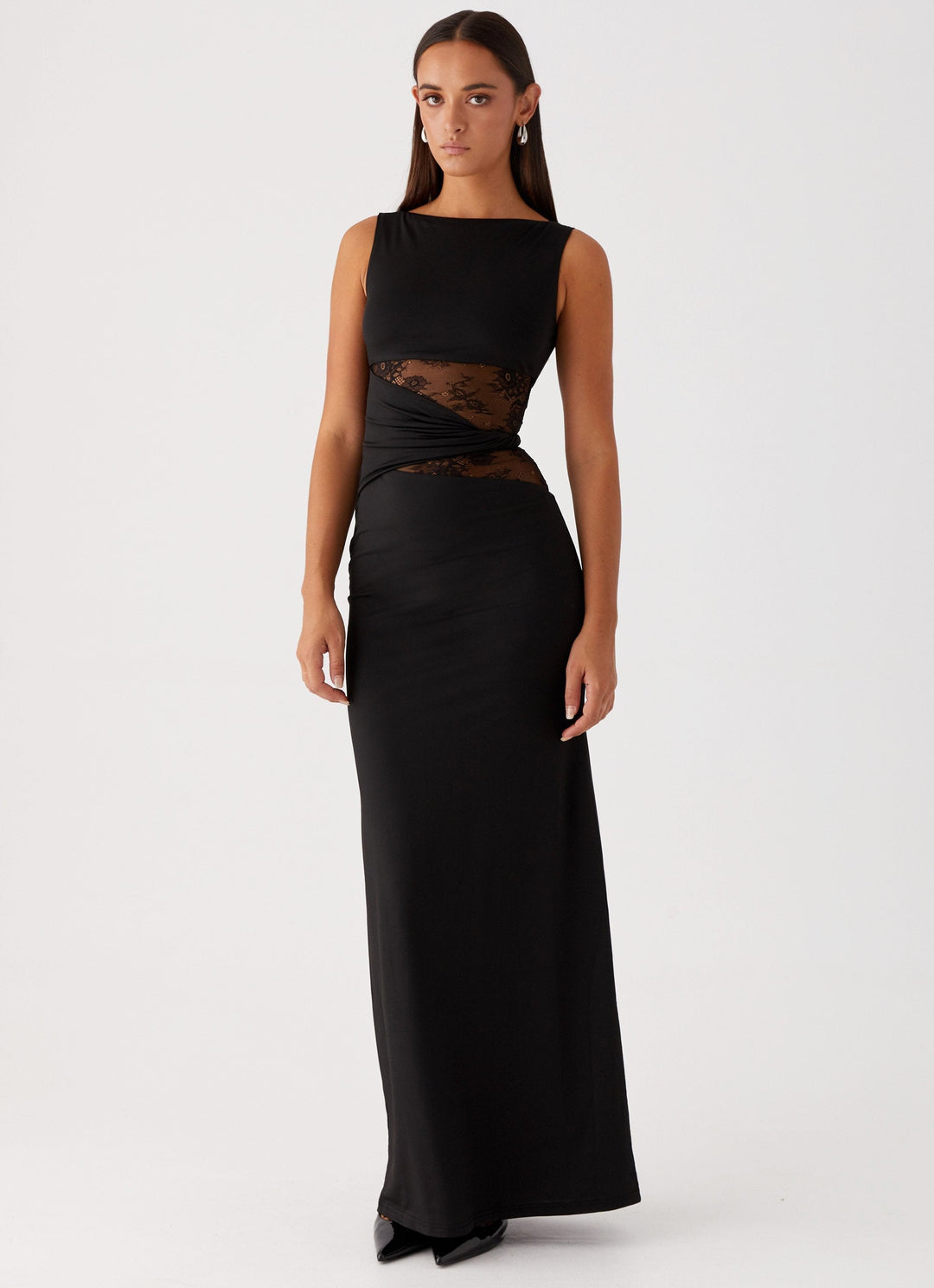 Elegant women's black lace cut out maxi dress with boat neck, perfect for formal evening events.