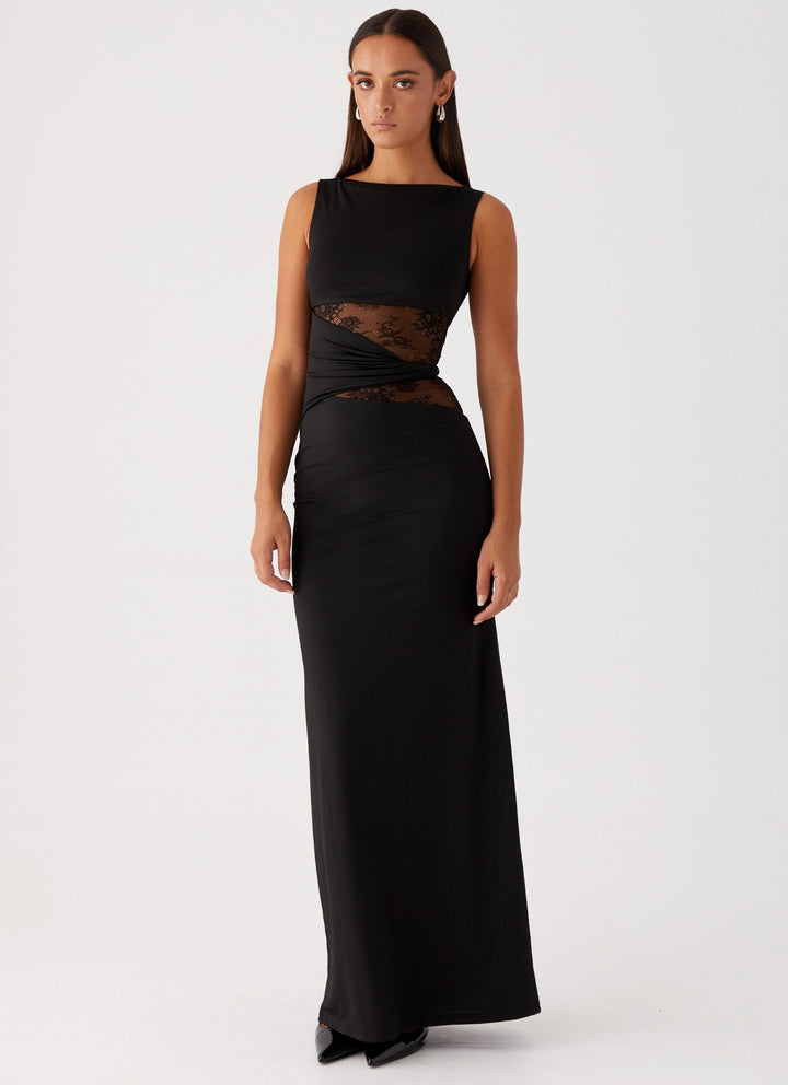 Elegant women's black lace cut out maxi dress with boat neck, perfect for formal evening events.