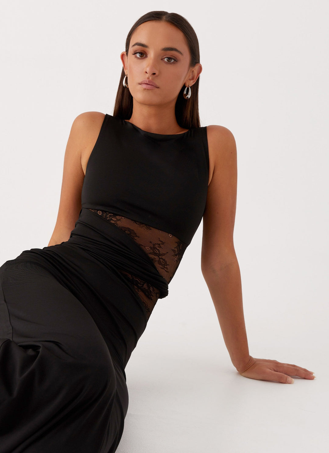 Chic women's formal evening gown: black lace cut out maxi dress with a stylish boat neck design.