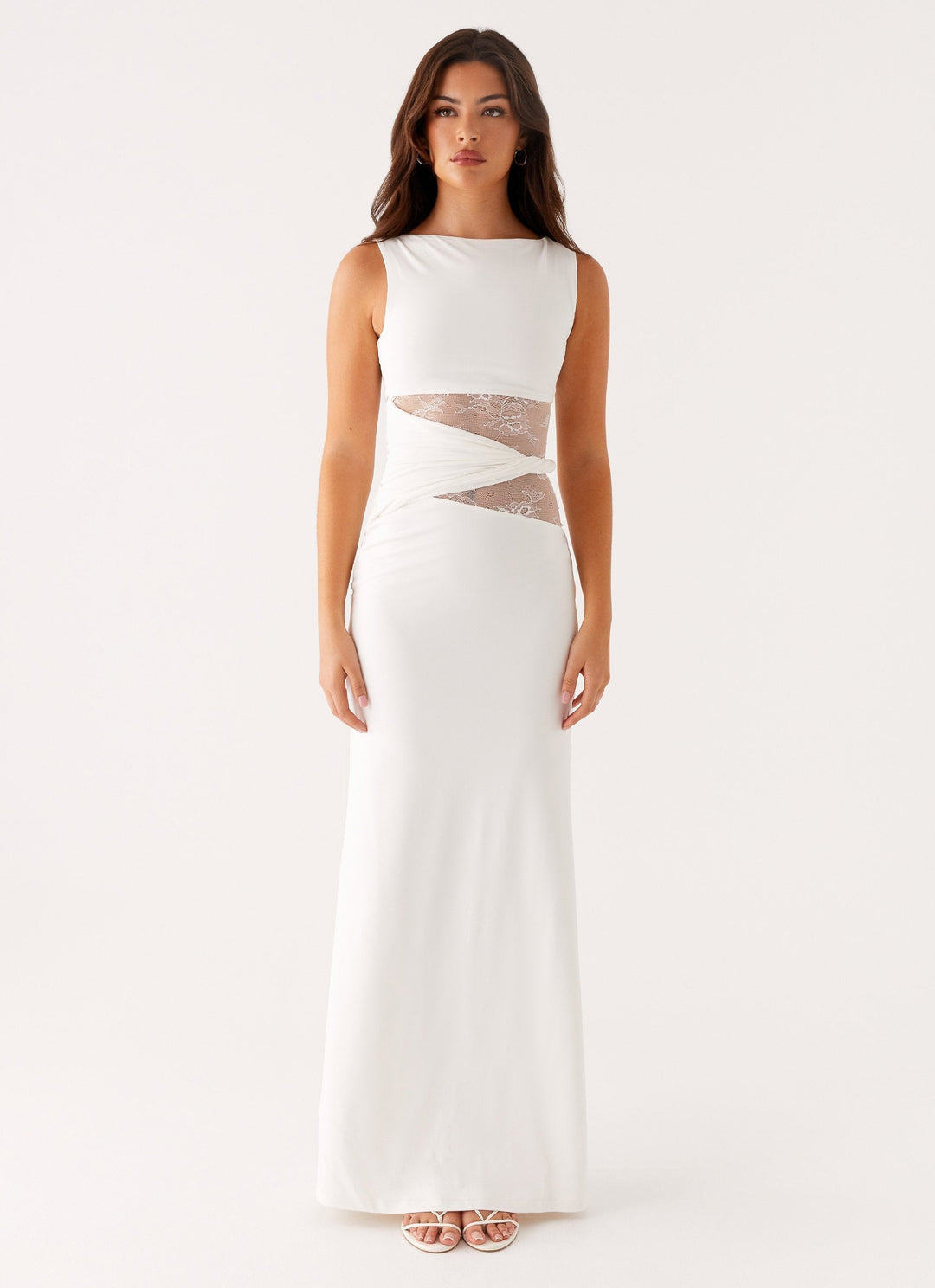 Beautiful white lace cut out boat neck maxi dress for women, perfect as an elegant formal evening gown.